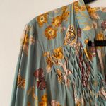 Free People  So Fine Smocked Blue Floral Butterfly Flowy Blouse Women size Medium Photo 2