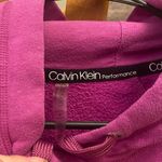 Calvin Klein  Performance Crop Hoodie size medium. 60%, cotton, 40% polyester. Photo 2