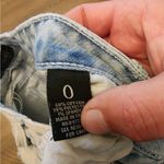 Almost Famous acid wash super distressed skinny jeans size 0 Photo 3