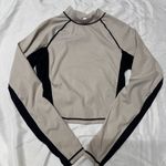 Fabletics  Beige and Black Stitch Top Photo 0