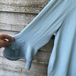 JODIFL NWT  size L faux wrap deep V blouson bell sleeves top. Photo 4