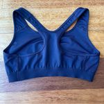 Nike Navy Blue Sports Bra with Racerback and Moisture-Wicking Fabric Photo 1