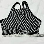 Kona Sol Medium Kona Sola black and white striped swim top. Photo 5