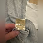 Women’s Gray crewneck knit top with accent sleeves size small Photo 10