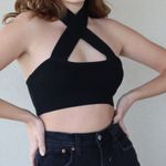 Tic Toc Black Twist halter crop in a ribbed sweater material Photo 1