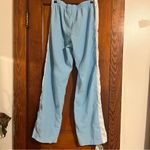 Nike Light Blue Track Pants with White Stripe Photo 1