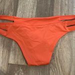 Tavik swim Tilly’s orange bikini bottoms Photo 1