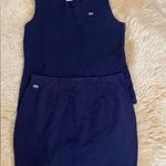 Lacoste set 2-pieces : navy pencil skirt in size 10 and tank top in size 8 Photo 0