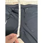 Nike  Dri-Fit Running Leggings Women's Size Medium Black Zip Legs Athleisure Photo 5