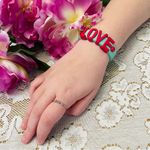 LOVE Slider Charm Bracelet Mint and Coral Pink Photo 1