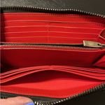 Christian Louboutin Studded Black Panettone Wallet with red interior. Photo 8
