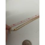 Boutique Gold tone rhinestone cross necklace Photo 4