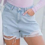 Pink Lily Stand Out Light Wash Distressed Denim Shorts Photo 1
