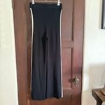 HOUSE of HARLOW 1960 | Black Rib Knit Flare Pants with White Stripe | Small Photo 1