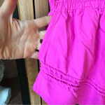 FP Movement Check It Out shorts neon barbie pink workout running pockets Photo 6