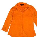 EXPRESS  Design Studio Women's Medium Orange Long Sleeve Button-Up Shirt Photo 0