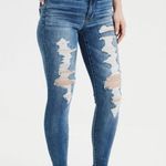 American Eagle  Outfitters super high rise ripped jeans Photo 0