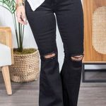 Boutique Women's Black High Rise Flare Distressed Raw Hem Denim Jeans Size Small Photo 0