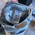 American Eagle  Light Wash Cross Waist Jean Photo 4