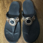 Crocs  Sanrah Diamante Wedge Flip sandals are a size 9. Photo 0