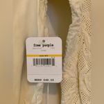 Free People  Ivory Long Sleeve Fitted Bodysuit.  Size-M/L Photo 3