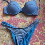 Triangl  Bikini (top small medium bottoms)  Photo 0