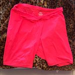 SKIMS  Vibrant Coral Colored Thin Bike Shorts Photo 0