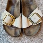Birkenstock  Cream Sandals with Gold Buckle Photo 1