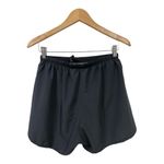 Saucony Women’s black running shorts. Size M Photo 1