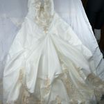David's Bridal . Style T8818 size 10 wedding dress. 
Worn once. Was cleaned. Photo 12