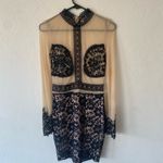 Agaci tan and black sheer long sleeve mini dress with embroidered detail Photo 2