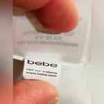 Bebe  striped off-shoulder dress.  Size 0 please the pictures for the measurement Photo 5