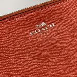 Coach  small wristlet clutch coral Photo 1