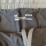 Under Armour  grey athletic shorts Photo 1