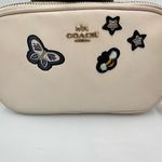 Coach CROSSBODY POUCH WITH SOUVENIR
EMBROIDERY ( F25946)
CHALK/LIGHT GOLD Photo 2