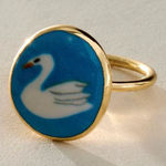 Free People  Gold Ring with Blue and White Swan Design Photo 0
