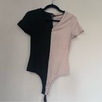 AQUA Ribbed Black and Tan Short Sleeve Bodysuit Photo 1