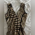 Elegant Black and Gold Sequin Dress Photo 1