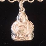 Sterling silver and peridot lucky charm bracelet. Photo 3