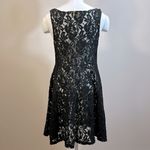 Free People  Black Lace Floral Goth Sheer Netting Unlined Mini Dress Size Medium Photo 1