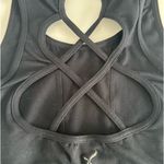 Capezio  black tank top with cut out design on back. Size large child Photo 3