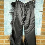 MARQUES' ALMEIDA
Feather Photo 6