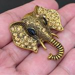 Unsigned Brass Gold Photo 2