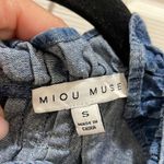Miou Muse Denim Ruffle Neck Button Down Back Sleeveless Top Photo 3