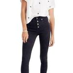Madewell Mid-Rise Skinny Jeans in Berkeley Black: Button-Through Edition Photo 0