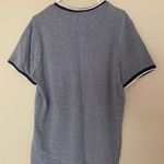 Stitches & Rivets T Photo 1