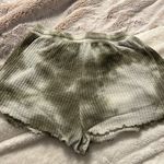 green shorts Photo 1