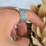 Adjustable ring with reversible color insert. Photo 1