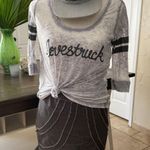 Xhilaration NWOT Gray Denim Xhiliration Mini skirt with side zipper and raw edged trim details. Size 5 Photo 4