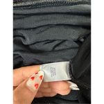 Jennifer Lopez metallic blouse Photo 3